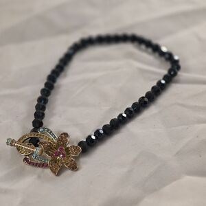 Heidi Daus Black Beaded Necklace with Gold and Multicolor Floral Clasp